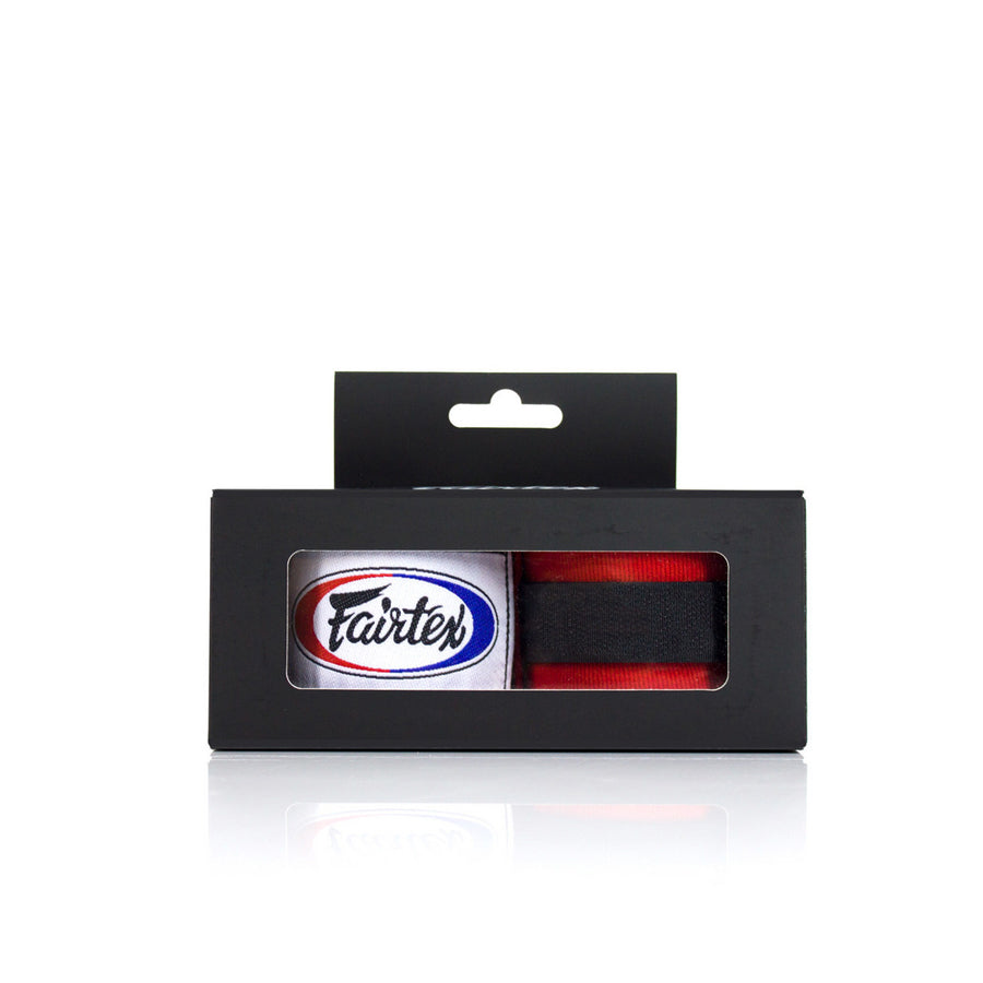 Fairtex käsiside. Elastinen hyvin käteen muotoutuva käsiside. Pituus 3m. Väri: punainen. Nyrkkeilyside. May thai, kickboxing. 