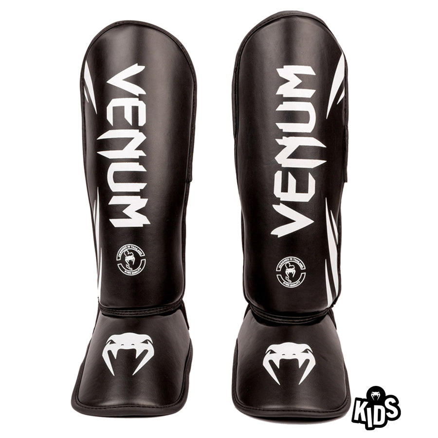 Venum Challenger lasten säärisuojat. Eriomainen kevyt lasten venum säärisuoja. Sopii hyvin mm. thainyrkkeily ja potkunyrkkeily harjoitteluun. Kuvassa säärisuojapari edestä kuvattuna. Pt-combat.fi